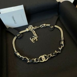 CHANEL 21S Gold & Leather Chain Turn Lock Choker